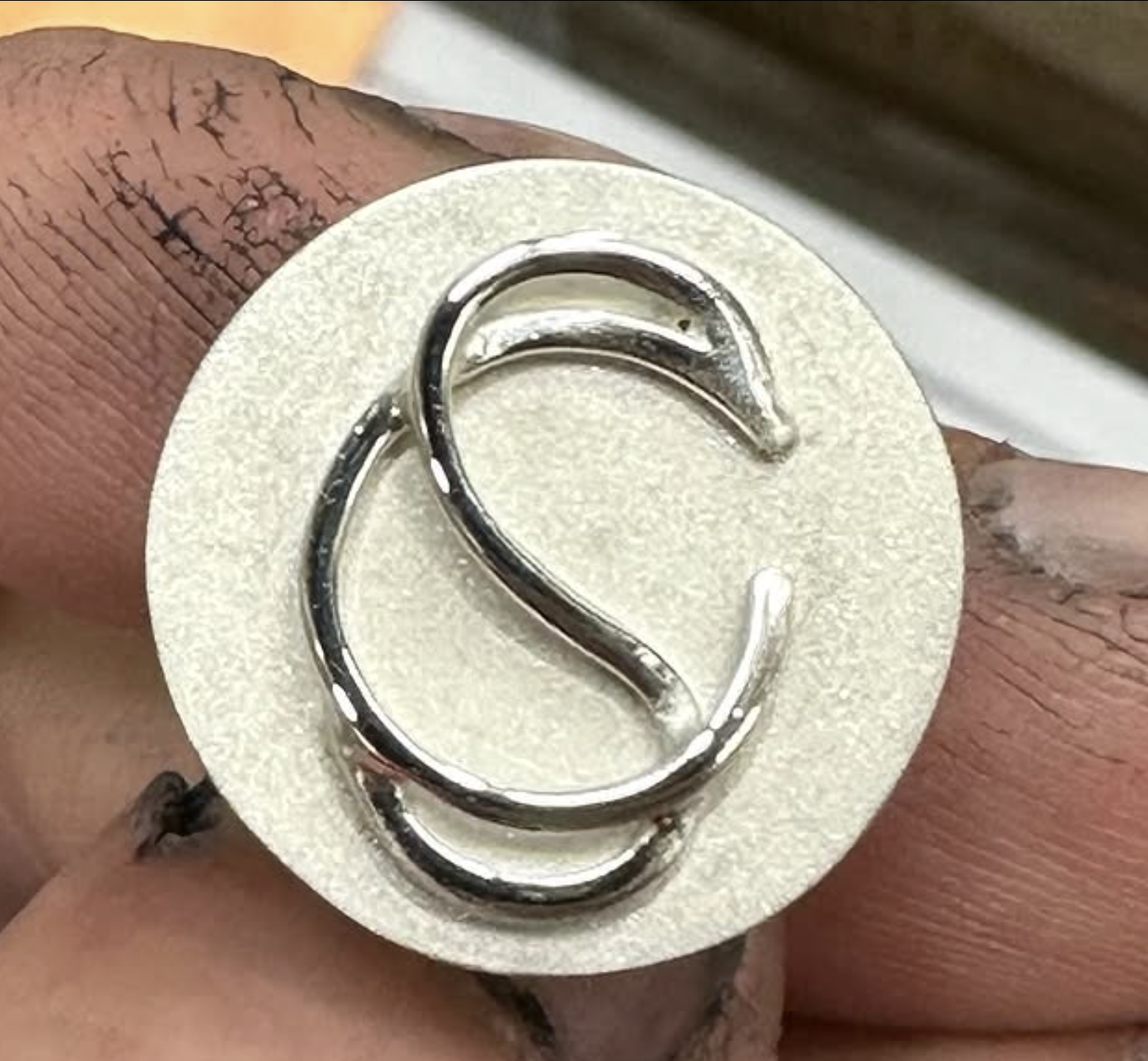 Statement initial ring — bright polished finish